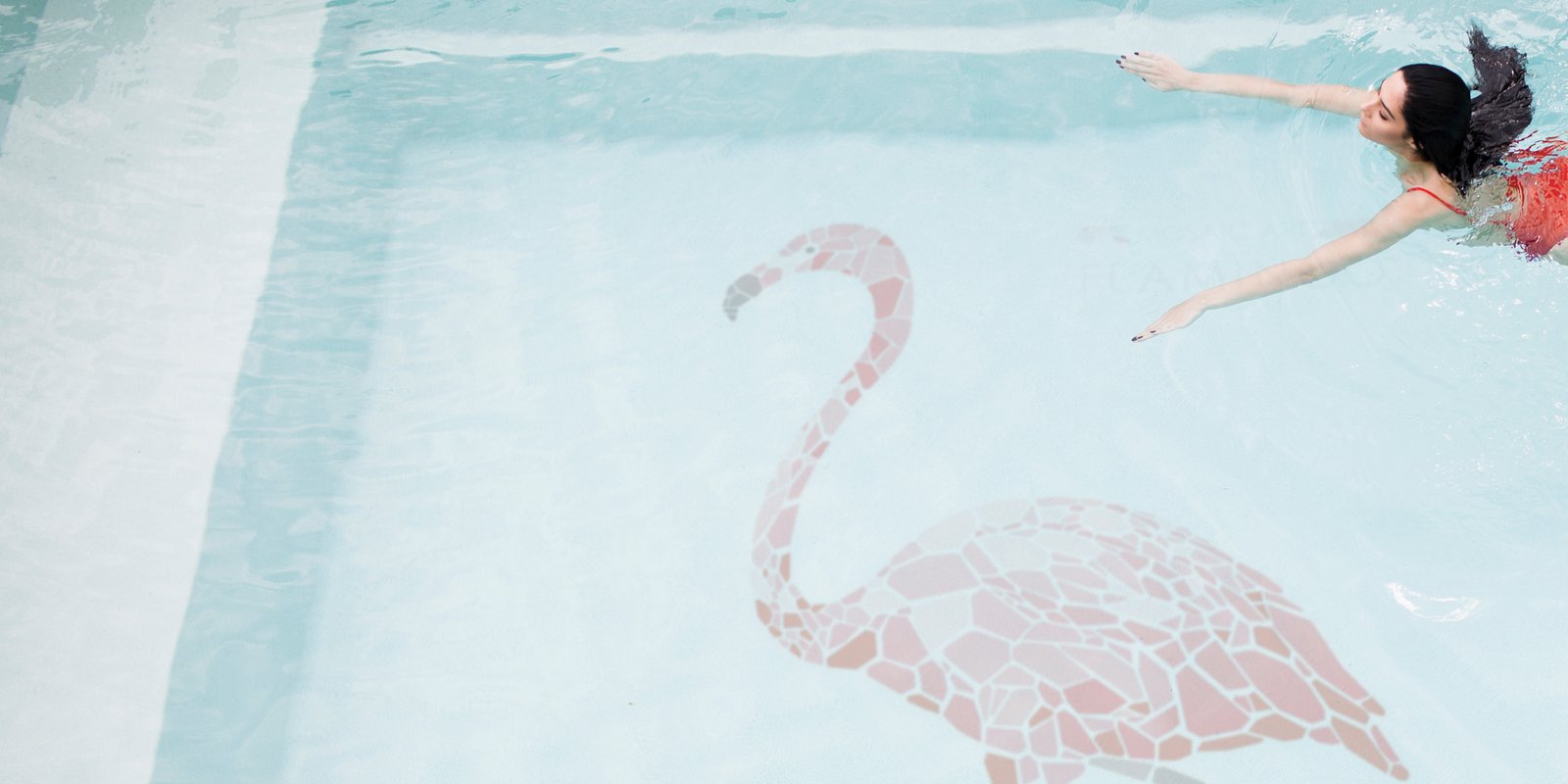 A woman swimming in a pool