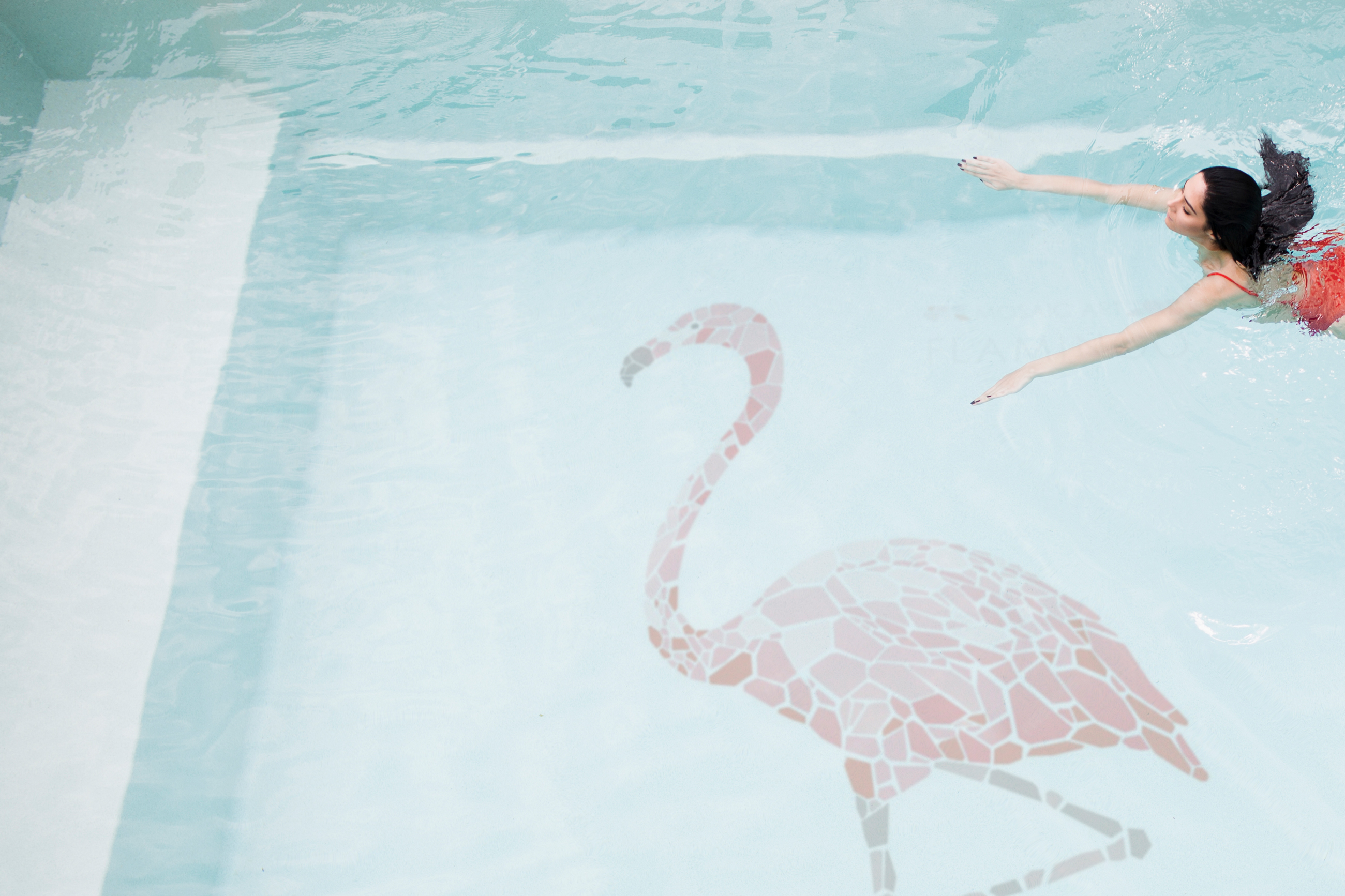 A woman swimming in a pool